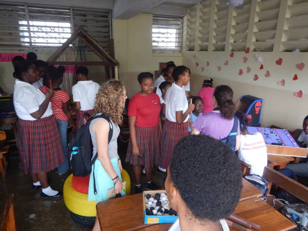 Viewing student projects at Collège Catts Pressoir School in Port au Prince, Haiti